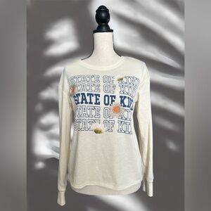 3/$15 DOE.  "State of Kind" Cream Long Sleeve Top